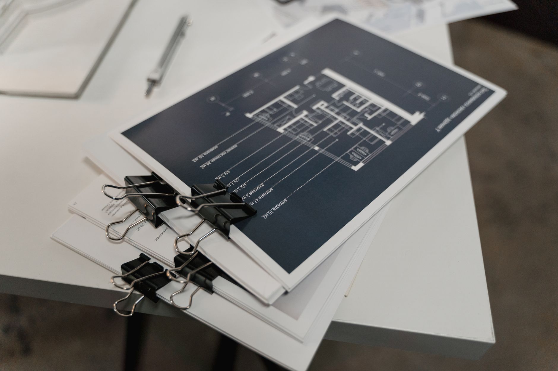 Engineering drawings being reviewed